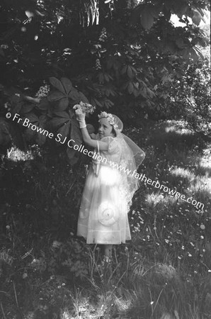 CARMEL BOWERS AT ALPHONOUS COURT DRUMCONDRA ON HER FIRST COMMUNION WAY CATH MARIE